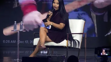 Dec 21, 2025; Phoenix, Ariz., U.S.; U.S. Nicki Minaj takes the stage with Erika Kirk at the Phoenix Convention Center during the